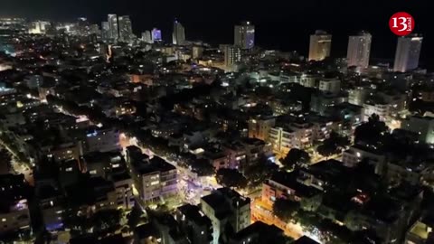 Drone footage shows ambulances and police at scene of shooting attack in Tel Aviv