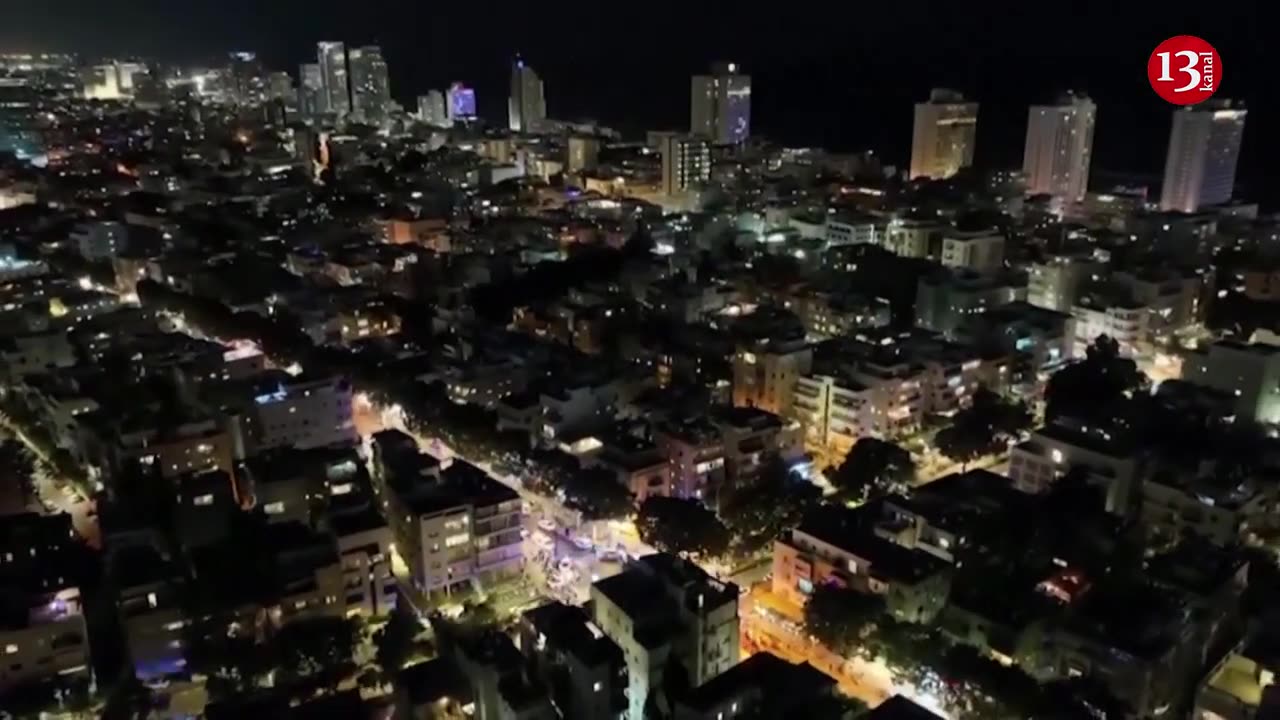 Drone footage shows ambulances and police at scene of shooting attack in Tel Aviv