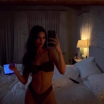 Kendall Jenner in black 🖤 bikini on her bed