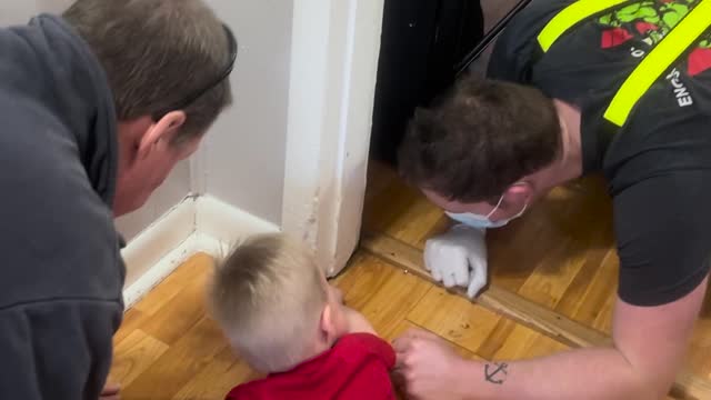 Distressed Toddler has Fingers Freed by Rescue Workers