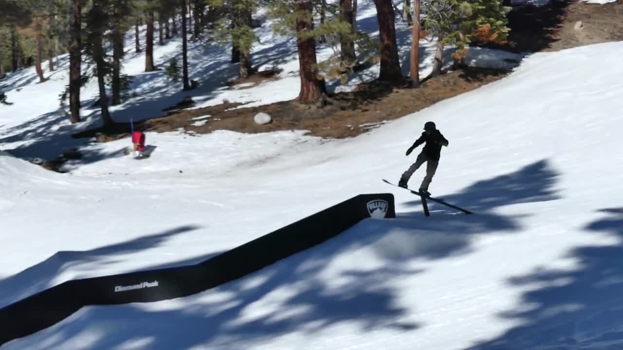 Snowboarder Lands Hands First Jumping a Ramp