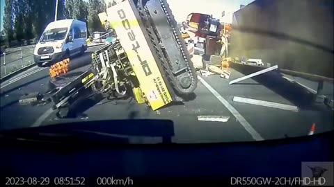 Crane falls on car