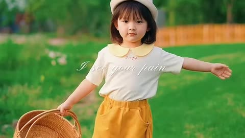 Baby picking flowers in the garden