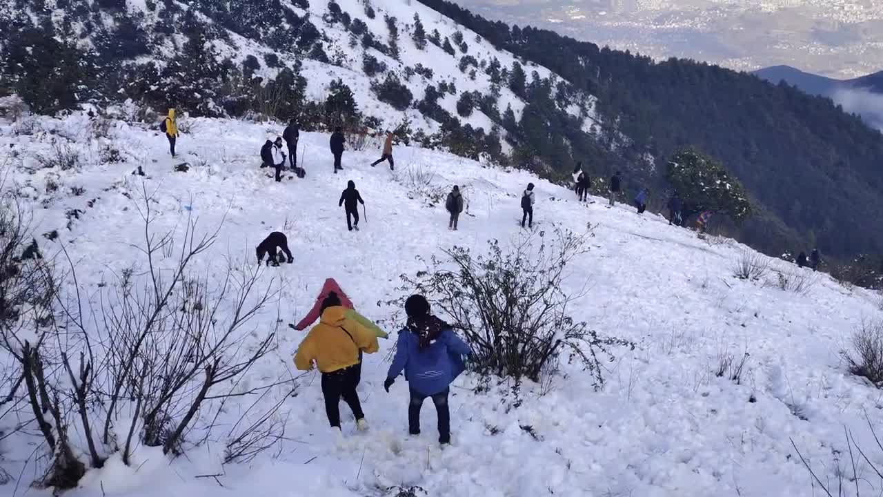 People enjoying snow.