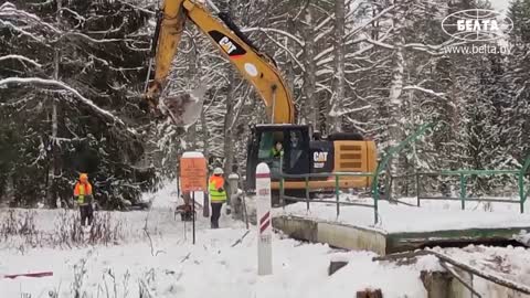 Latvian authorities demolish pedestrian bridge over the Sinyuha River