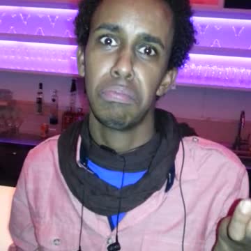 guy opens a beer with his teeths