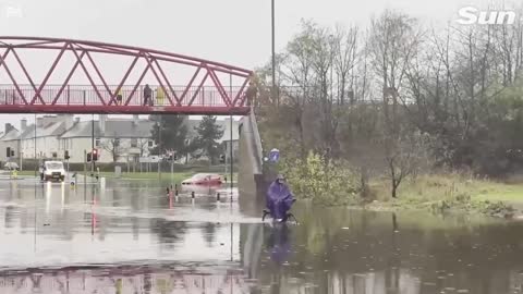 Britain hit by flash flooding as showers lash down causing havoc on roads_3