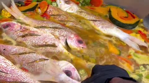 Frying fish in Jamaica