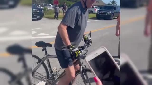 Joe Biden Falls Over On The Ground During Bike Ride