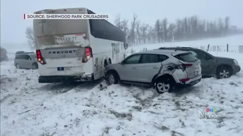Near whiteout conditions cause dozens of crashes in Edmonton, junior hockey team bus included