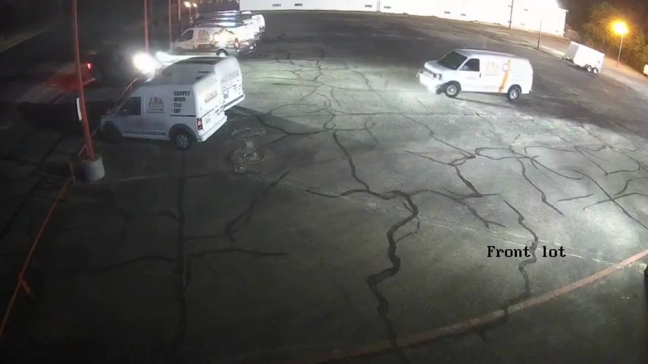 SUV Speeds Away After Colliding with Parked Service Van