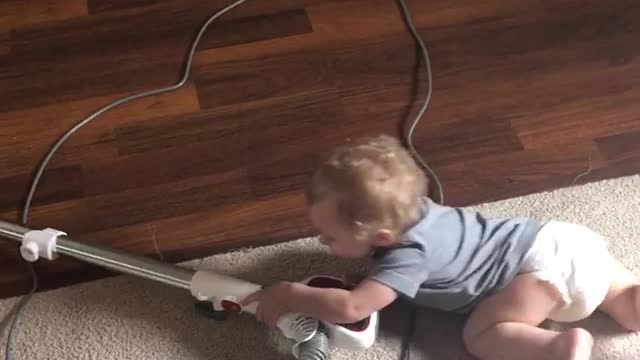 Baby loves to clean