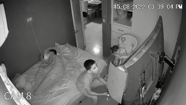 Brother Stops Gaming to Put Baby Sibling into Bed