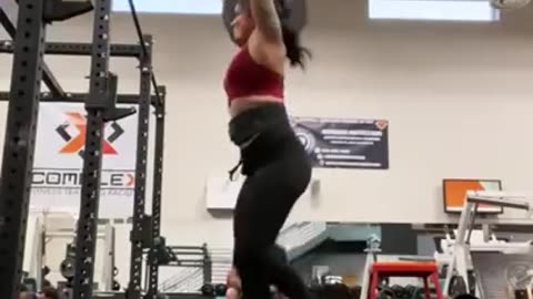 Strong Girl At Gym Lift Weight