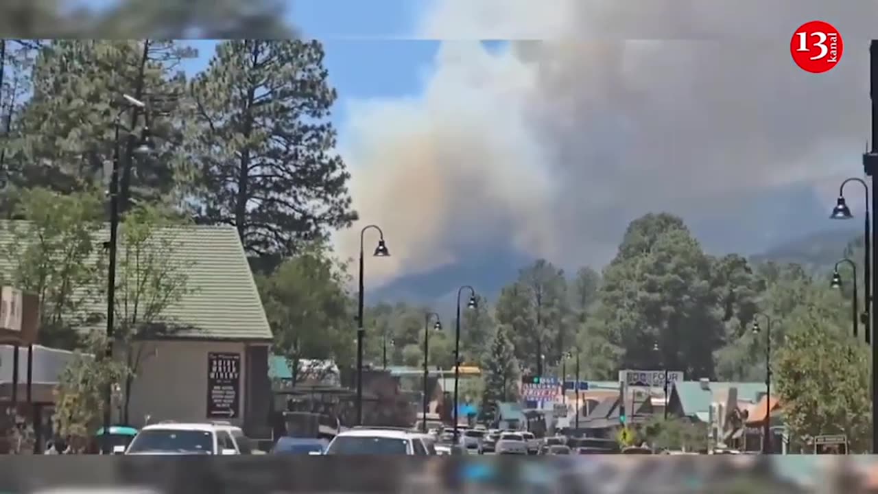 Wildfire in New Mexico kills at least one person, forces thousands to flee