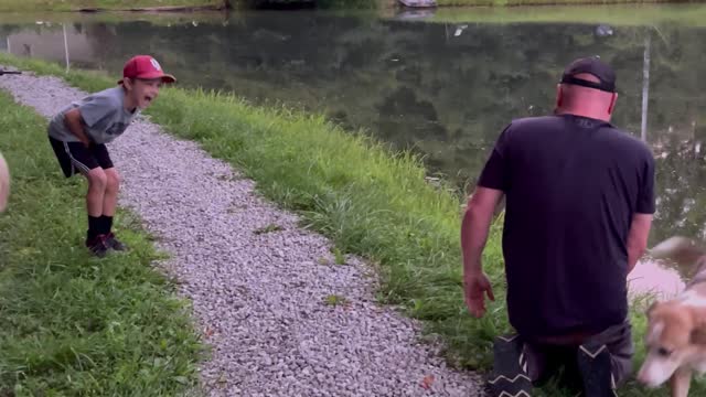 Man Slapped By Large Fish