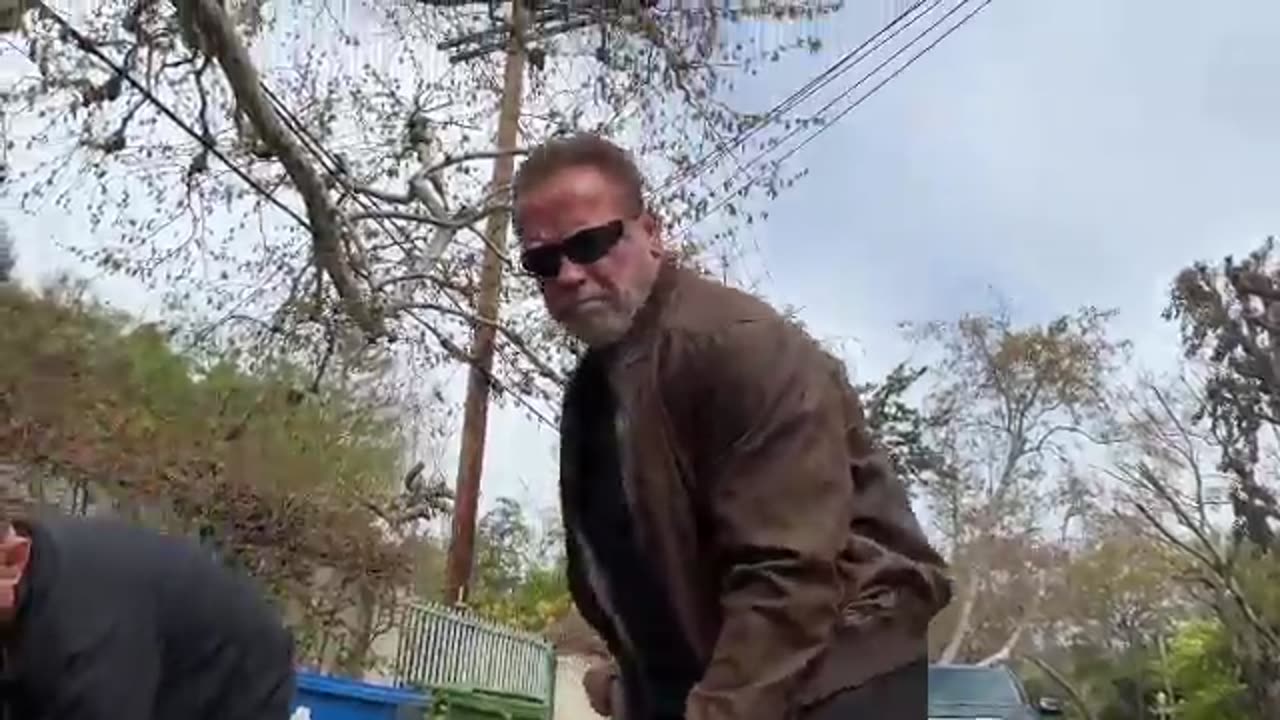 The pothole creates traffic disruption, so Schwarzenegger repairs it with his own hands