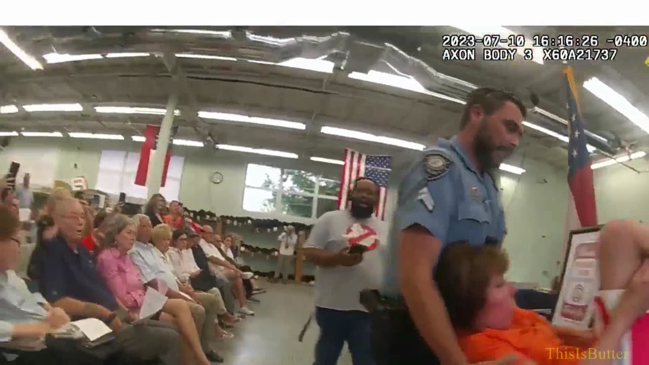 Police forcibly remove woman from Georgia county Board of Elections meeting