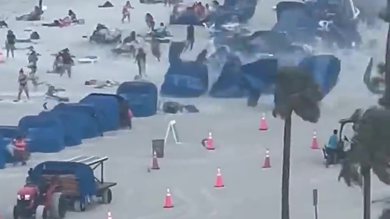 Footage captures waterspout ripping through crowded