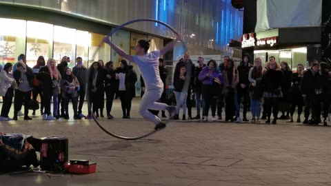 People watching circus on the street