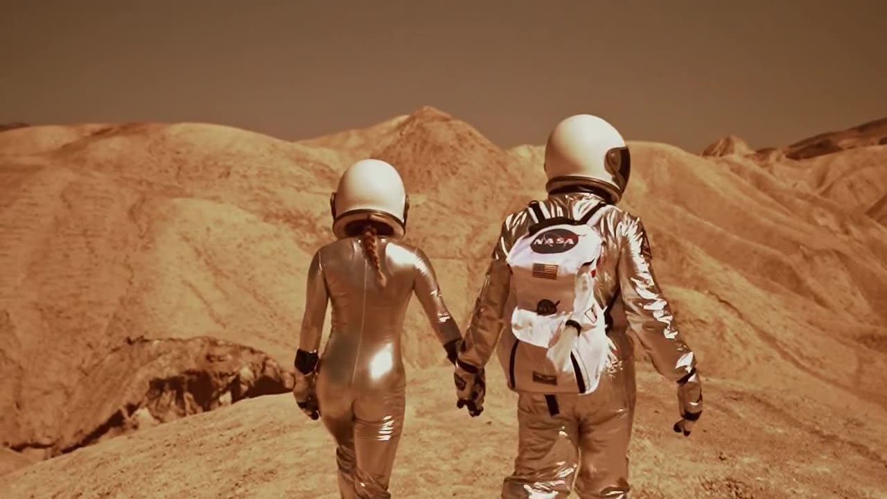 An Astronaut Couple Walking on Mars