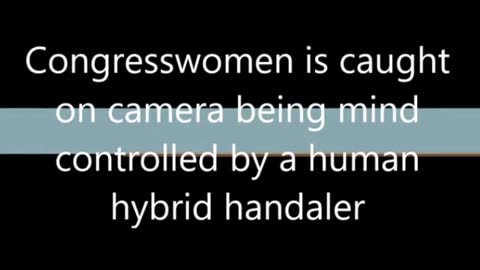 CONGRESSWOMEN ON CAMERA LOOKS LIKE MIND CONTROL BY HUMAN HYBRID HANDLER