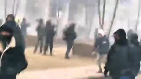 Black bloc rioters smash up buildings and attack police in Brussels