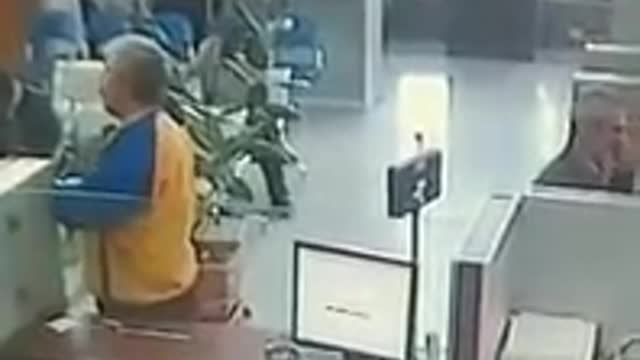 Caught on camera: Man steals cash inside a bank