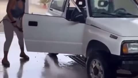 Funny people, girl decides to wash inside and outside of car