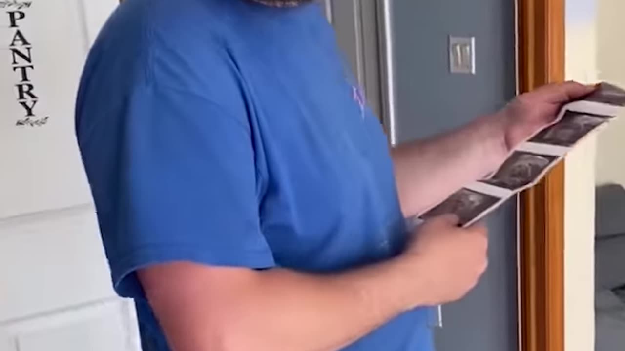 Woman Surprises Husband with News of Twins