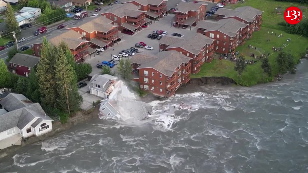 MOMENT: Alaska house collapses into river