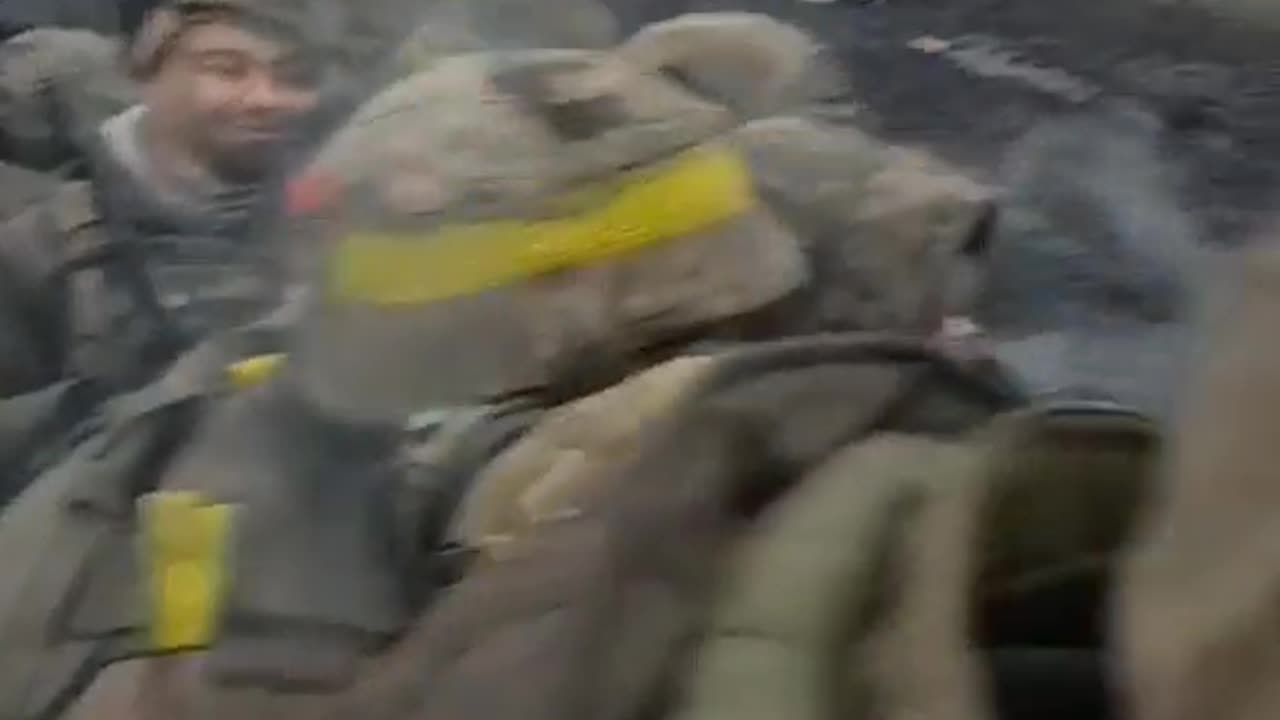 A group of Ukrainian servicemen pass by a broken AFU column in the Bakhmut direction.