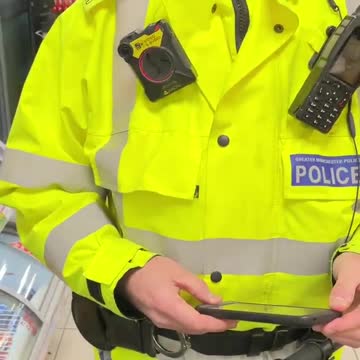 Police trying to arrest a man in Manchester for not wearing a Mask