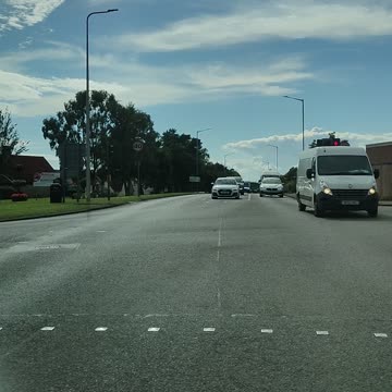 Emergency Ambulance at traffic lights in Scotland