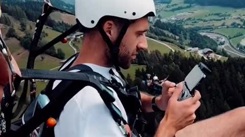 Using a drone while paragliding!