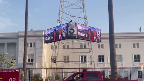 A man has climbed the KTLA tower in Hollywood. LAPD is shutting down Sunset Blvd.