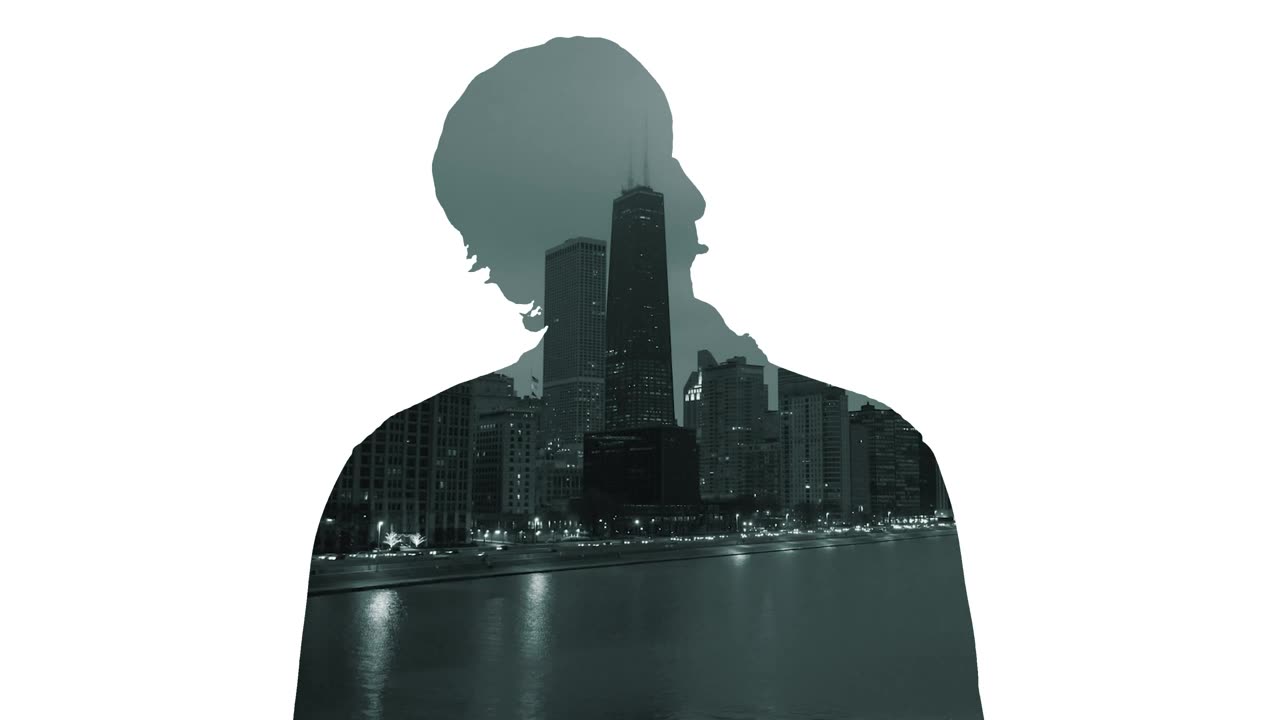 Silhouette of a man and a city