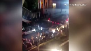 Video shows Tehran university protesters fleeing police