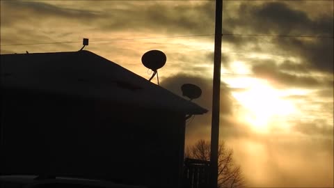 Snow Storm Blowing Past and Blocking the Sun