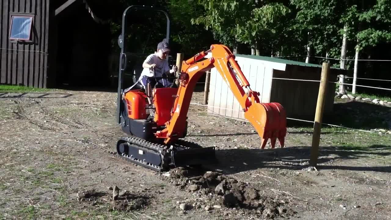 Jims Excavator #7 Daniel digging a hole with the Kubota K008-3 excavator.