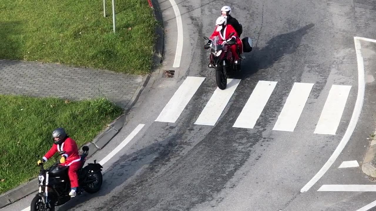 Santa riding a bike for Christmas in Viana do Castelo