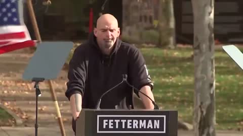 Fetterman says he is "ready to serve Pennsylvania" while American flags are being blown away