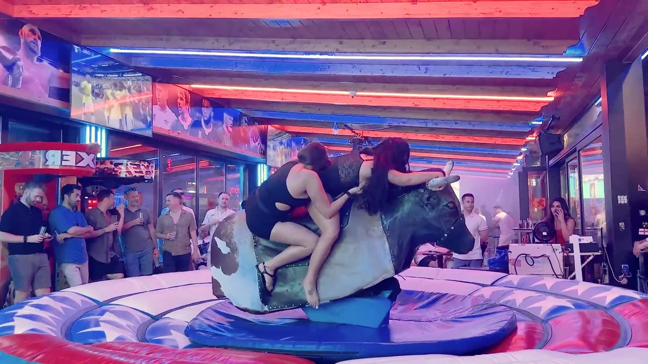 GIRL TAKE ON THE BULL! Benidorm Bull Ride. Mechanical Bull EPIC FAIL