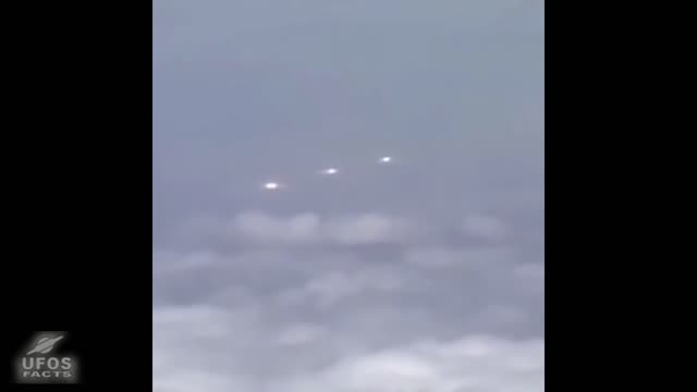 UFOs filmed by an airline passenger.