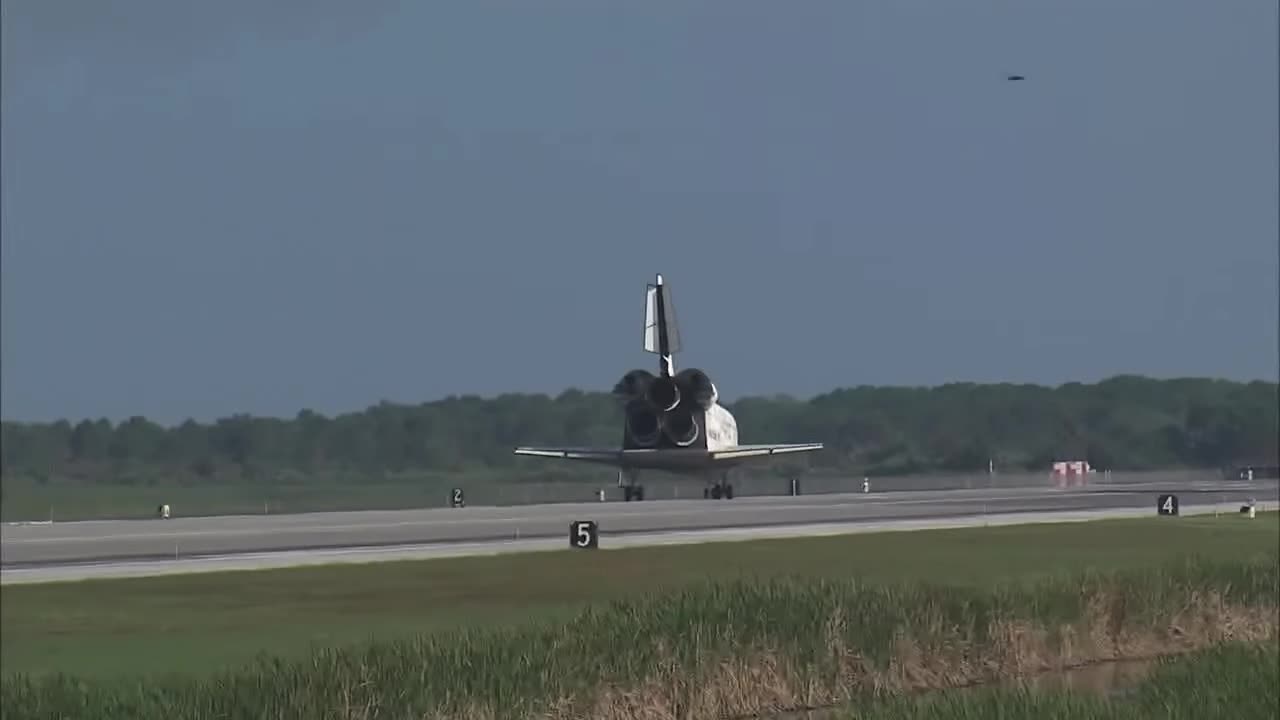 Triumphant Return: Discovery Touches Down at Kennedy!