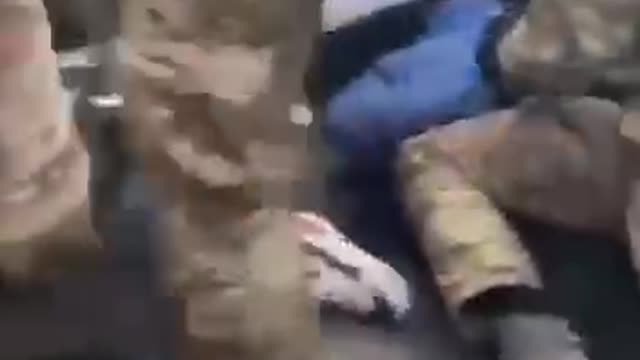 Ukrainian Security Forces Beating Unarmed Civilians