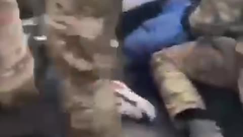 Ukrainian Security Forces Beating Unarmed Civilians