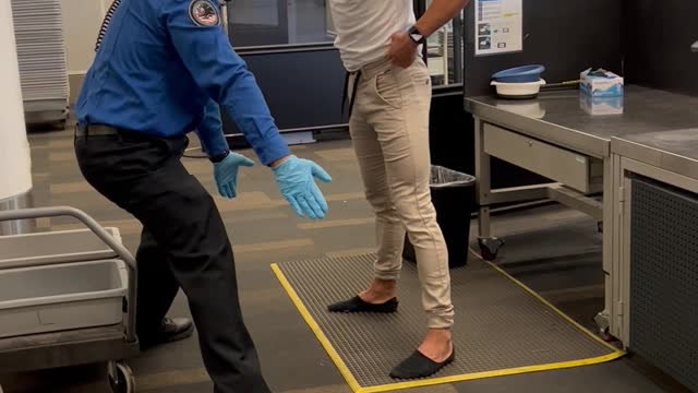 Man Gets Awkward Pat-Down by TSA Agent