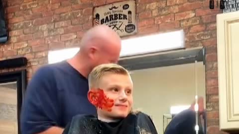 This hairdresser is very good. He has just cut the child's hair