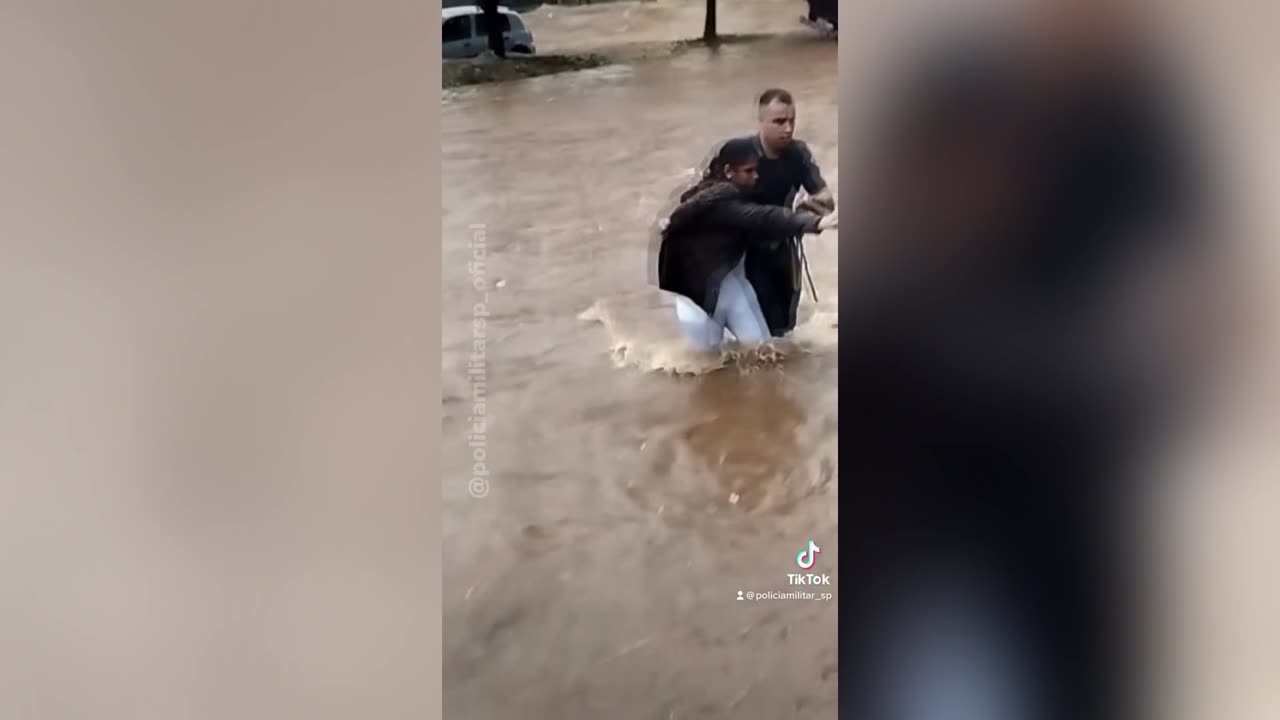 CITY HEROES: Officers Defy Raging Flood To Rescue Trapped Citizens